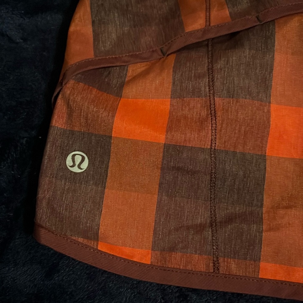 Lululemon Athletica Red and Brown Athletic Shorts with Bold Checkered Pattern